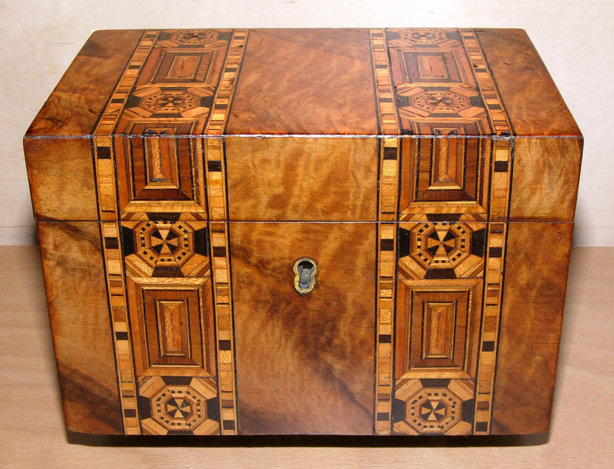 A wooden tea box, the kind often used for gifting loose leaf tea