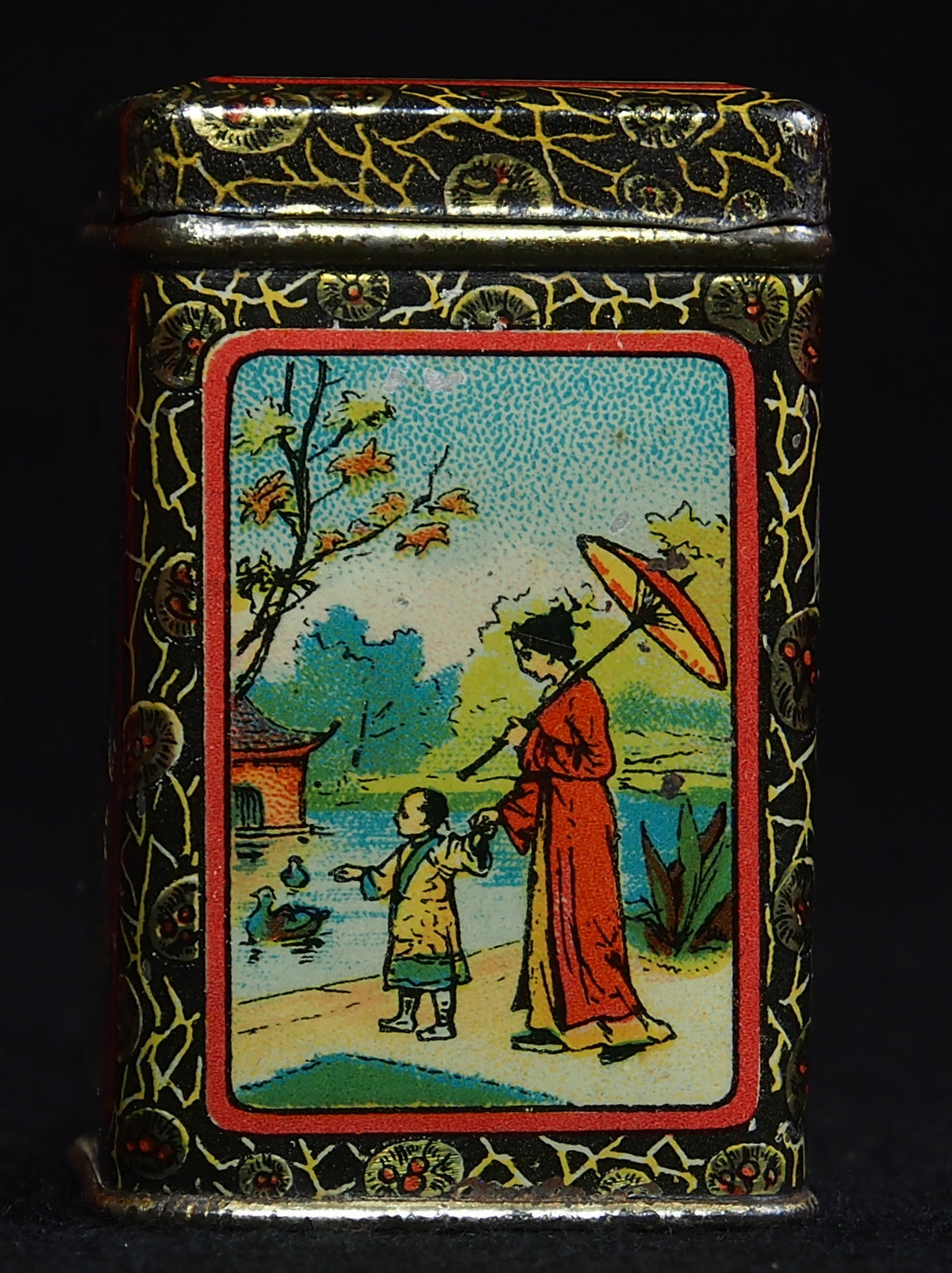 Vintage tea tin used for storing loose leaf tea, representing proper jasmine tea storage